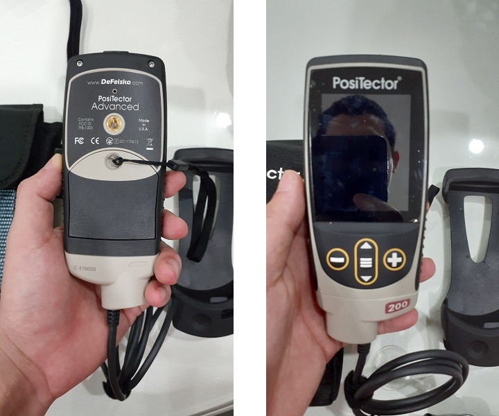 Máy đo độ dày lớp phủ DeFelsko PosiTector 200C3 mặt trước và mặt sau
